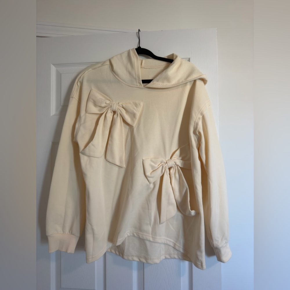 NWOT Boutique Elegant Cream Sweater with Bow Accents